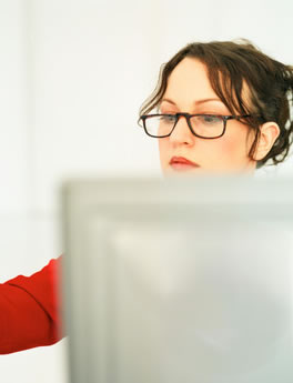Woman at computer using Property Helix